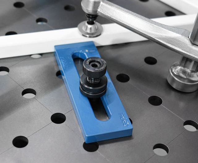 Stop och distans för svetsbord