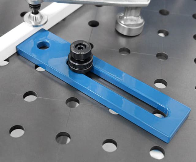 Stop och distans för svetsbord