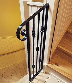 smidesräcke i trappa inomhus